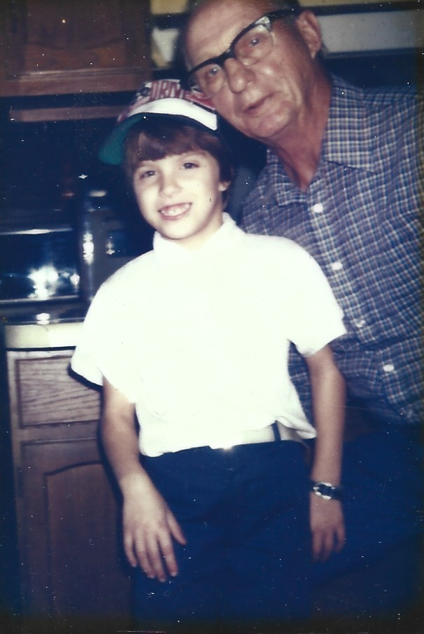 A photo of a young Natasha with her grandfather, Oscar. Photo permission given to Onward Sister by Natasha Parvey.