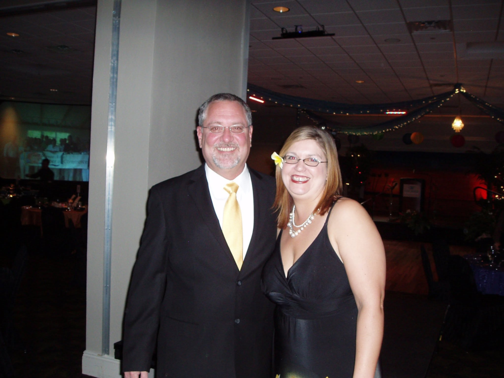 Natasha and her husband, Art dressed in formal wear at a Chamber Gala in Gulf Breeze, Florida. Photo permission given to Onward Sister by Natasha Parvey.