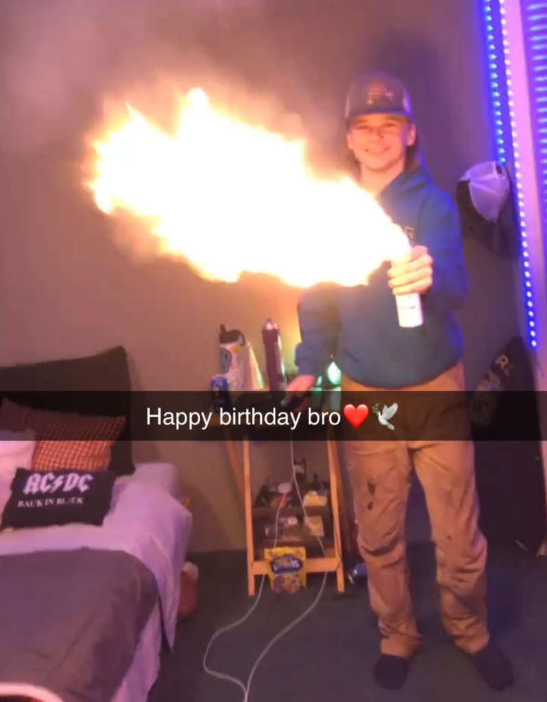 A photo of Alex using a can of hairspray like a flamethrower in his sister's room. Sandi collected the photo from Alex's friend, who wrote, "Happy Birthday, bro." Photo copyright: Sandi Mueller. Permission for use given to Onward Sister by Sandi Mueller.